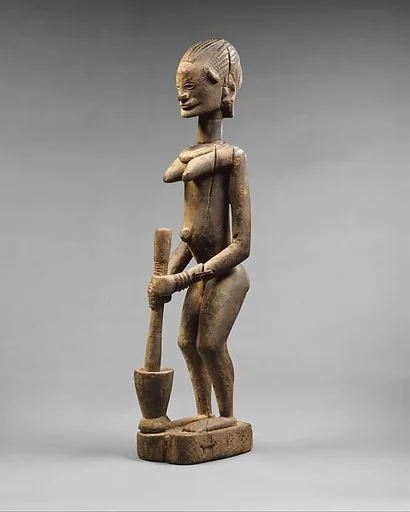 Figure: Female with Mortar and Pestle