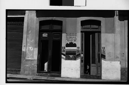 [Barber Shop "La Confianza" Doorways with Painted Advertisements on Wall, Havana]