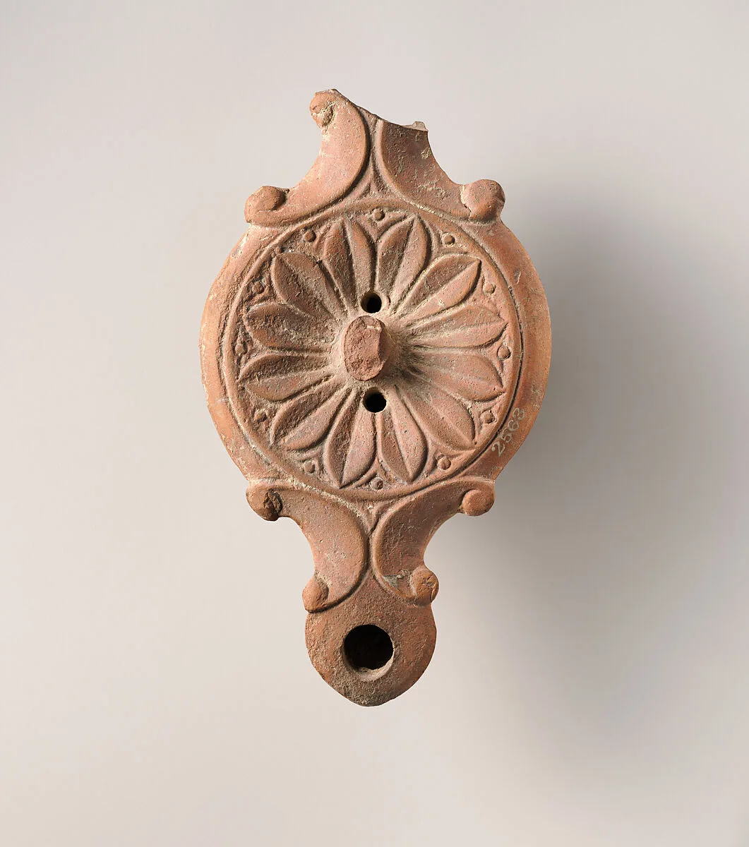 Terracotta oil lamp — Unknown