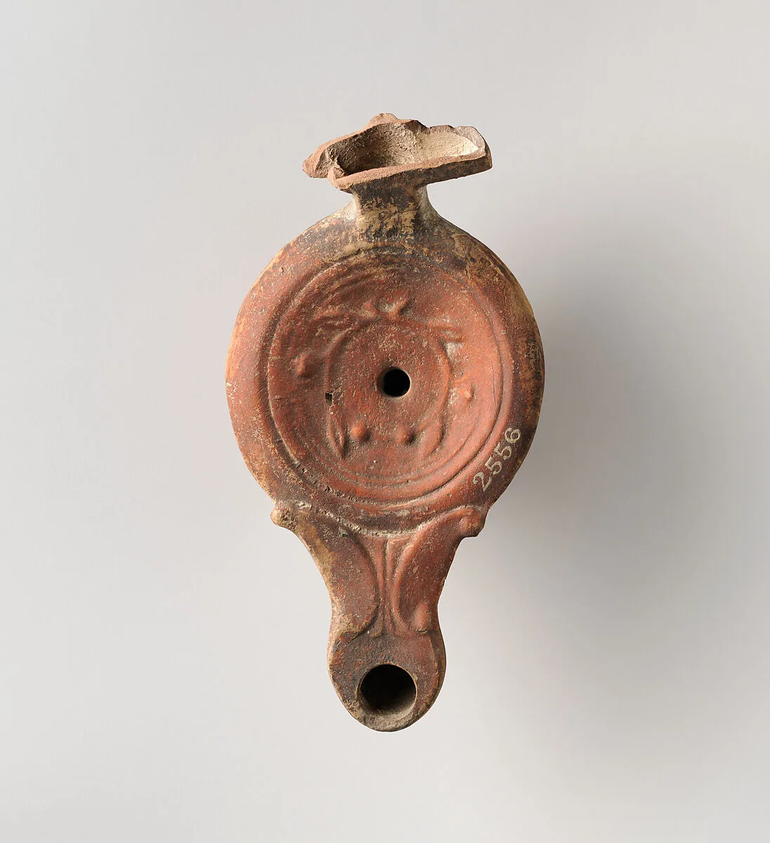 Terracotta oil lamp — Unknown