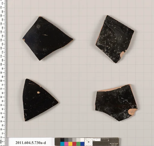 Terracotta fragments of kylikes (drinking cups)