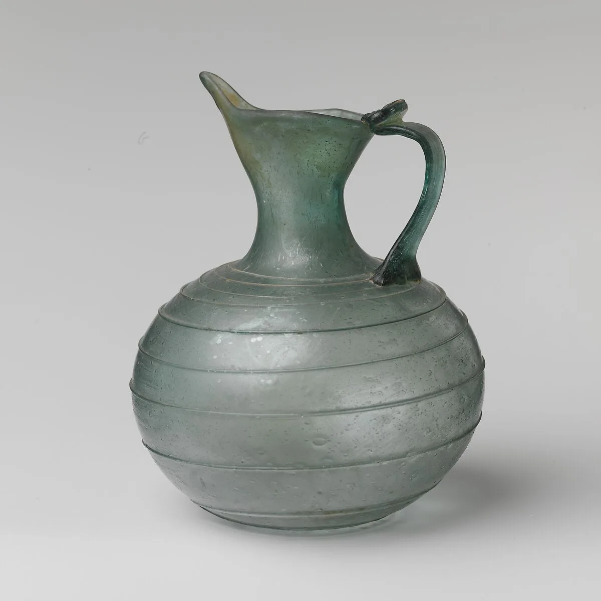 Glass spouted jug — Unknown