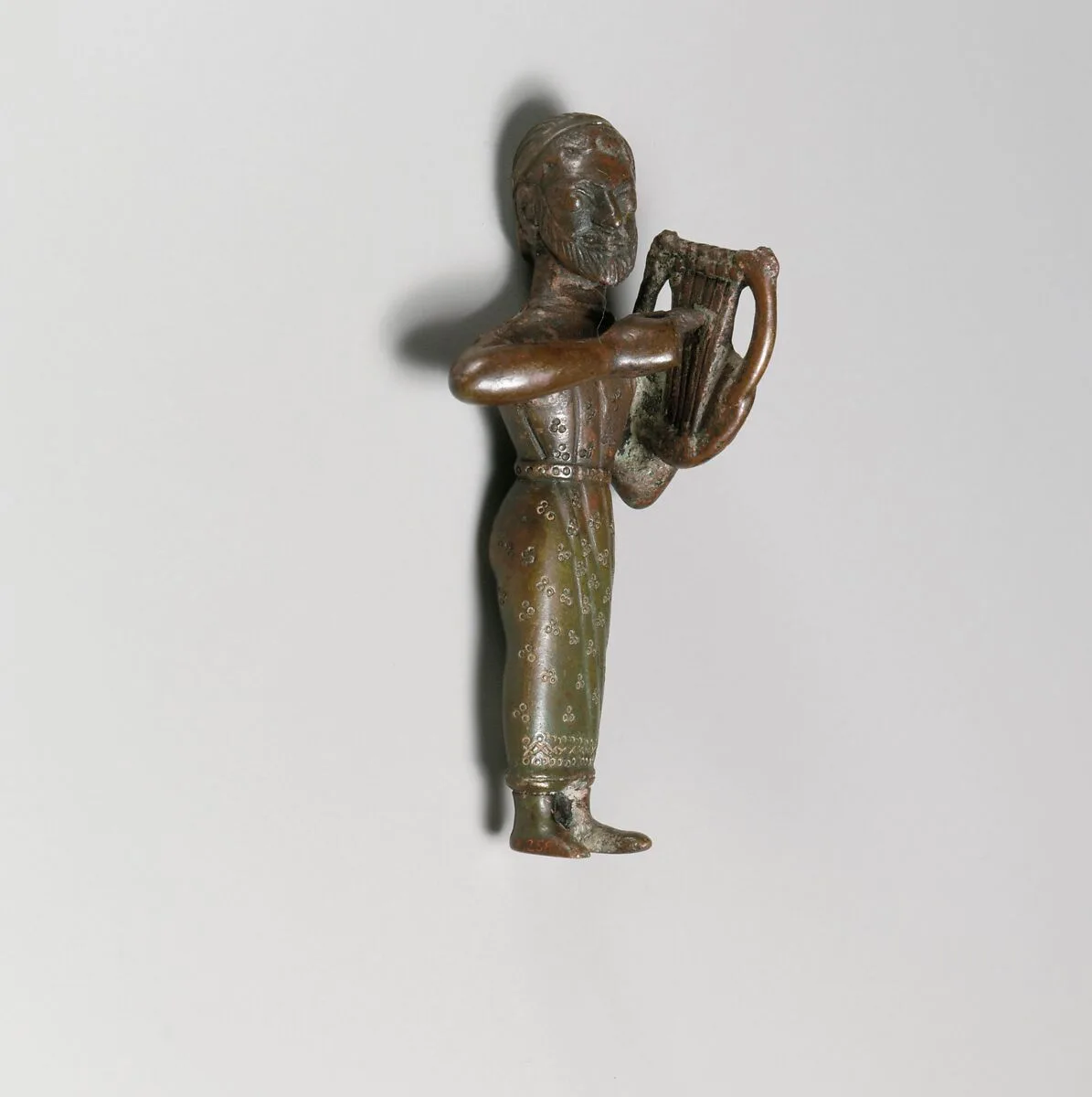 Statuette of a harp (lyre) player, male — Unknown