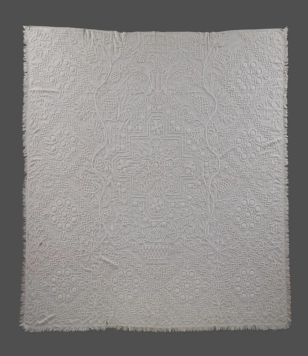 Embroidered coverlet — A. S. S.