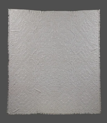 Embroidered coverlet