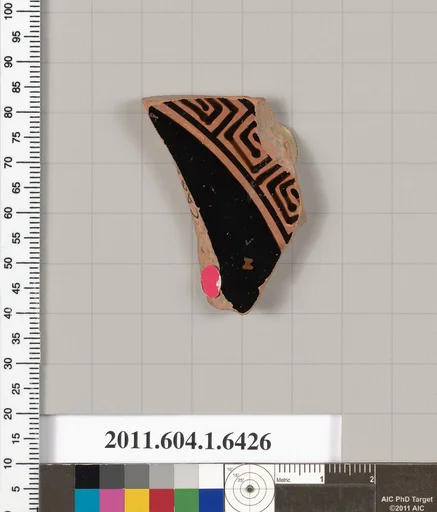 Terracotta fragment of a kylix (drinking cup)