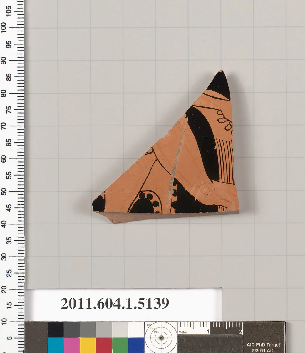 Terracotta fragment of a kylix (drinking cup) — Onesimos