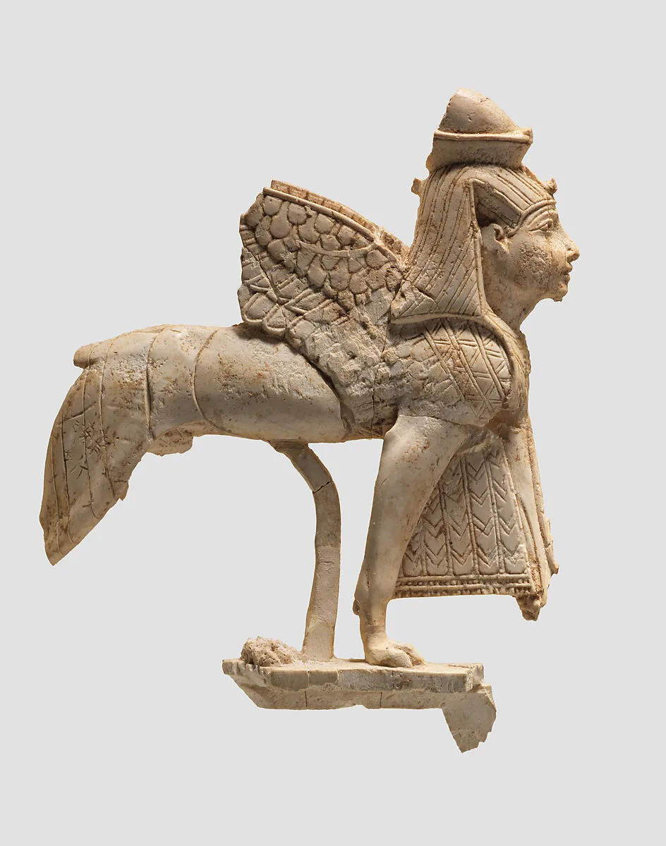 Openwork furniture plaque with a striding sphinx — Unknown