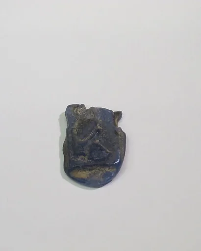 Mold-pressed amulet or fragment