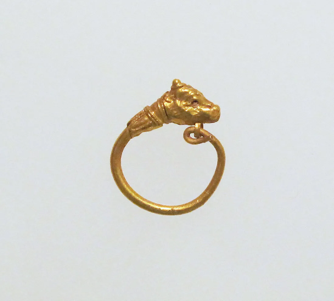 Gold earring with head of a bull — Unknown