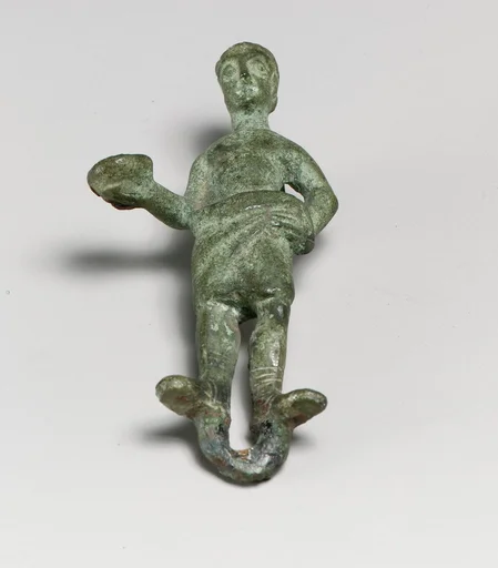 Statuette of a man with patera