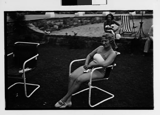 [Two 35mm Film Frames: Woman in Bathingsuit Seated in Tubular Chair at Country Club?; Roadside Gas Station]