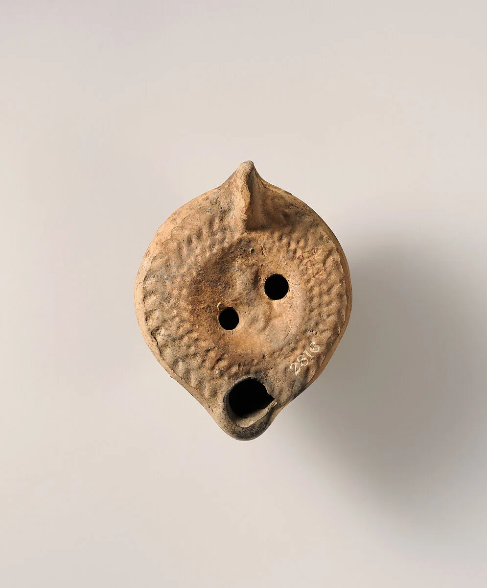 Terracotta oil lamp — Unknown