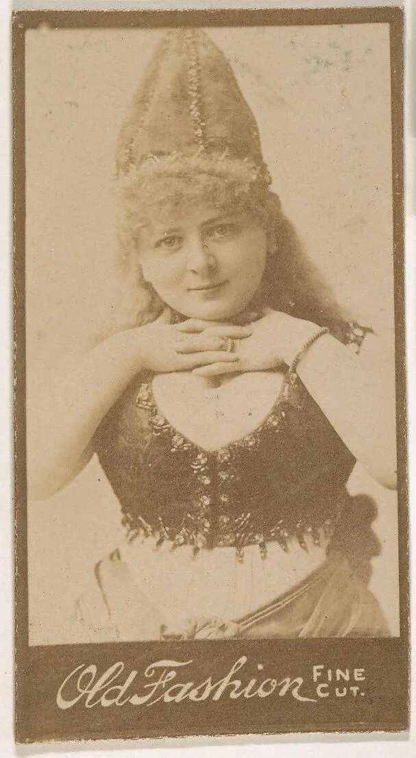 Actress wearing pointed cap, from the Actresses series (N664) promoting Old Fashion Fine Cut Tobacco — Unknown