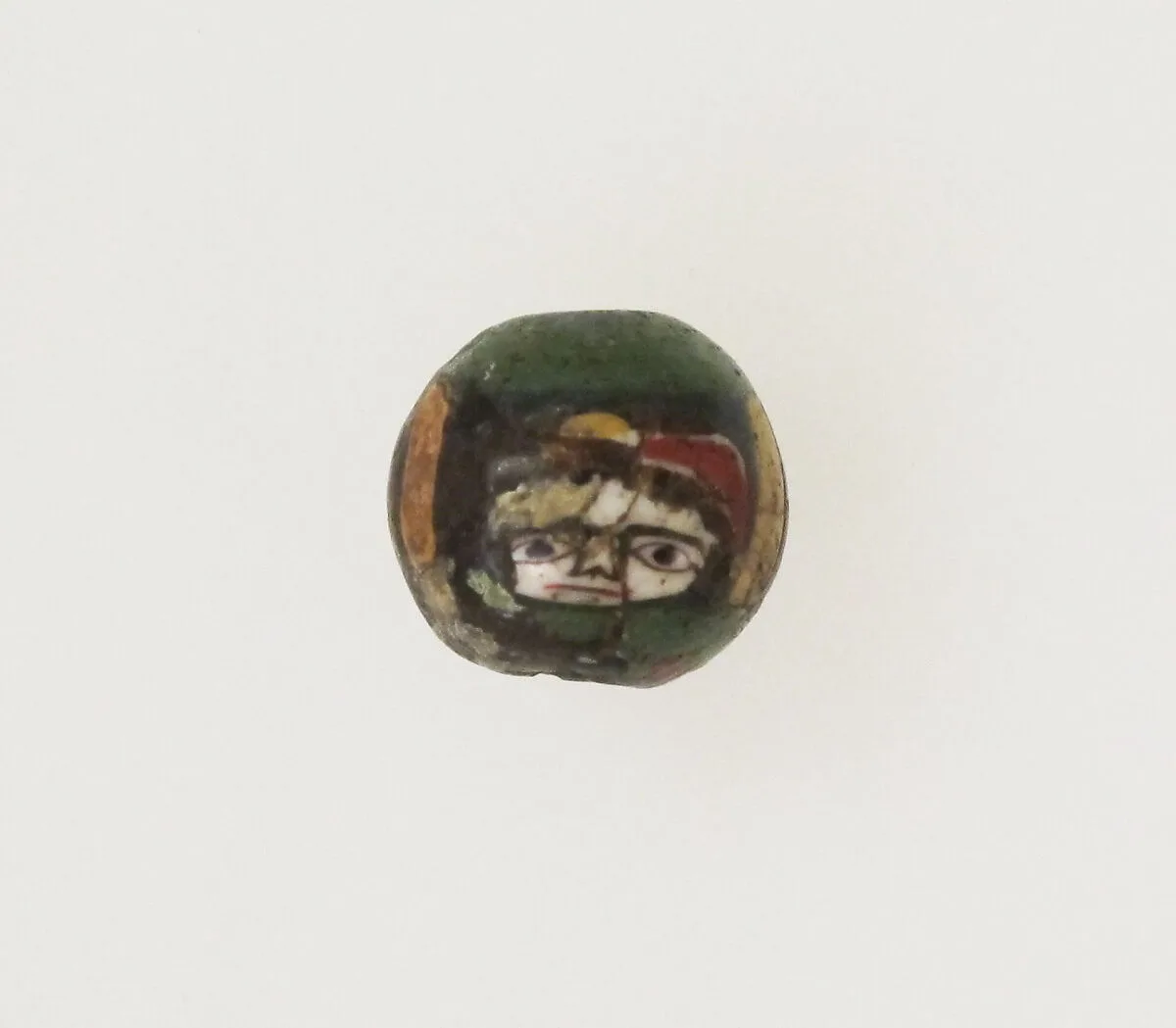 Glass mosaic face bead — Unknown