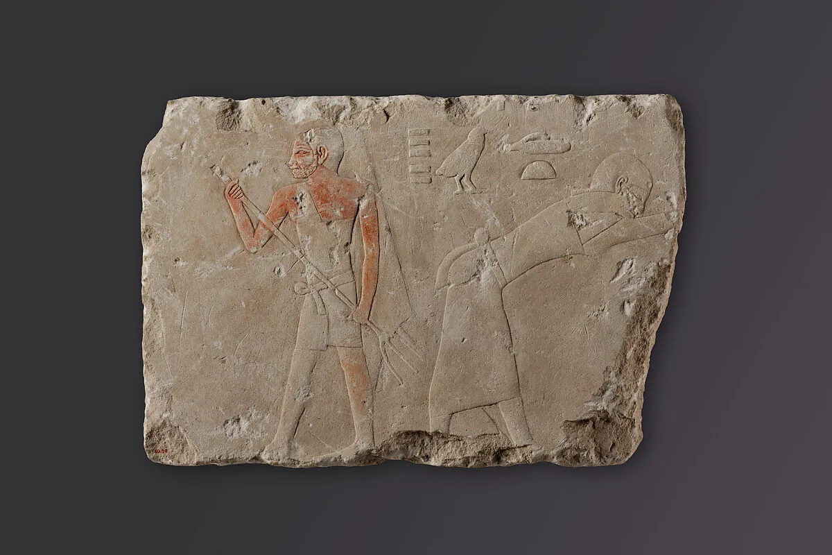 Relief fragment depicting two figures winnowing — Unknown
