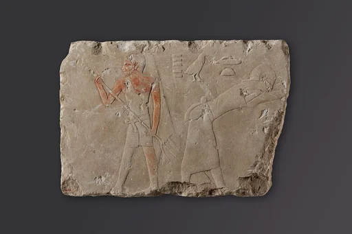 Relief fragment depicting two figures winnowing
