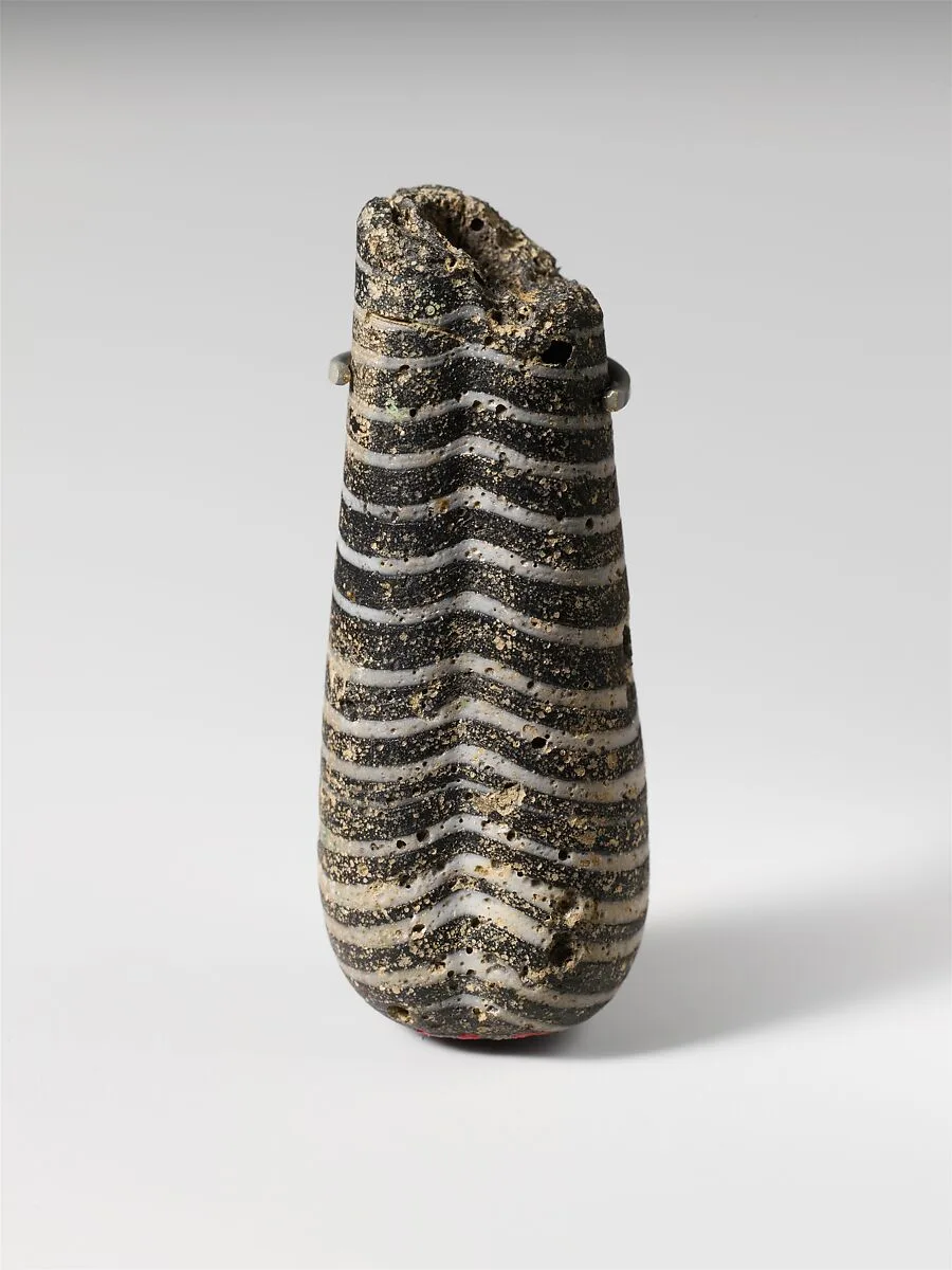 Glass pendant bead in the shape of a plumbline — Unknown
