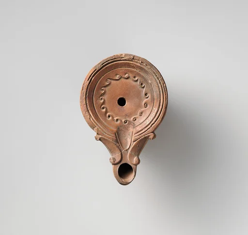Terracotta oil lamp