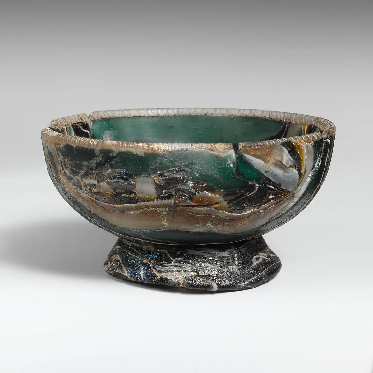 Glass striped mosaic bowl — Unknown