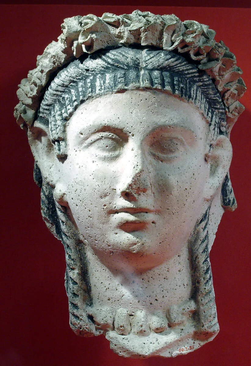 Mask of a woman with ball earrings, corkscrew locks and bang — Unknown