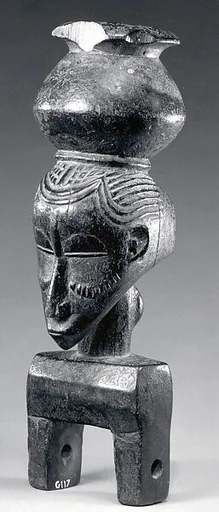 Heddle Pulley with Female Figure and Vessel