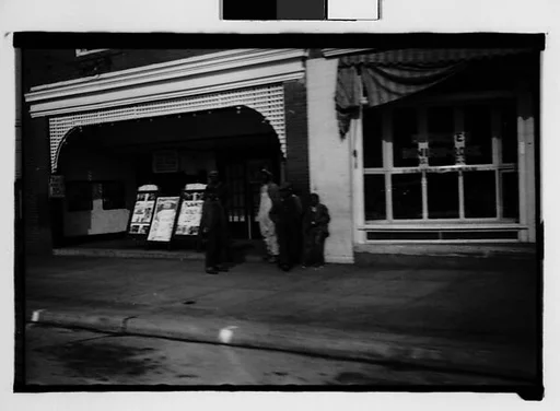 [Group Outside Movie Theater, From Moving Automobile, Macon, Georgia]