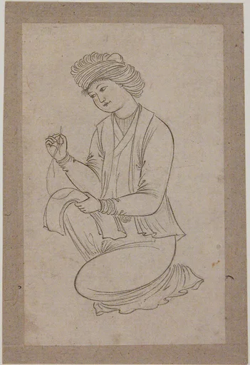 Young Man Sewing