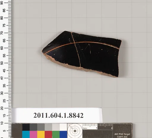 Terracotta fragment of a kylix (drinking cup)