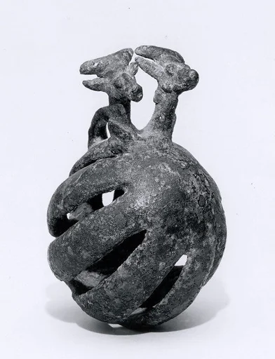 Openwork rattle bell