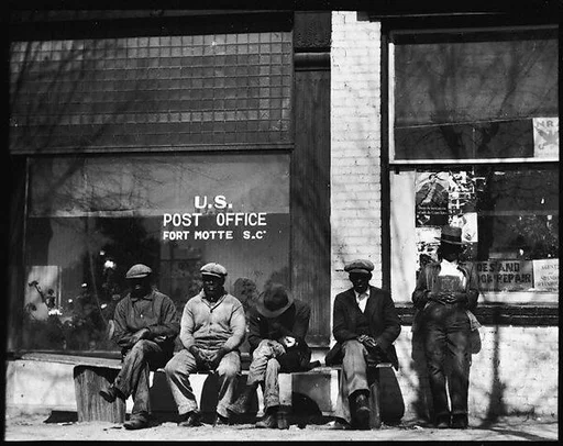 [Men Seated on Bench in Front of Post Office, Fort Motte, South Carolina]