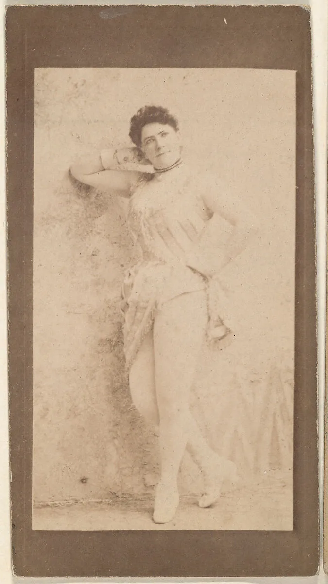 Actress leaning against wall, from the Actresses series (N668) — Unknown