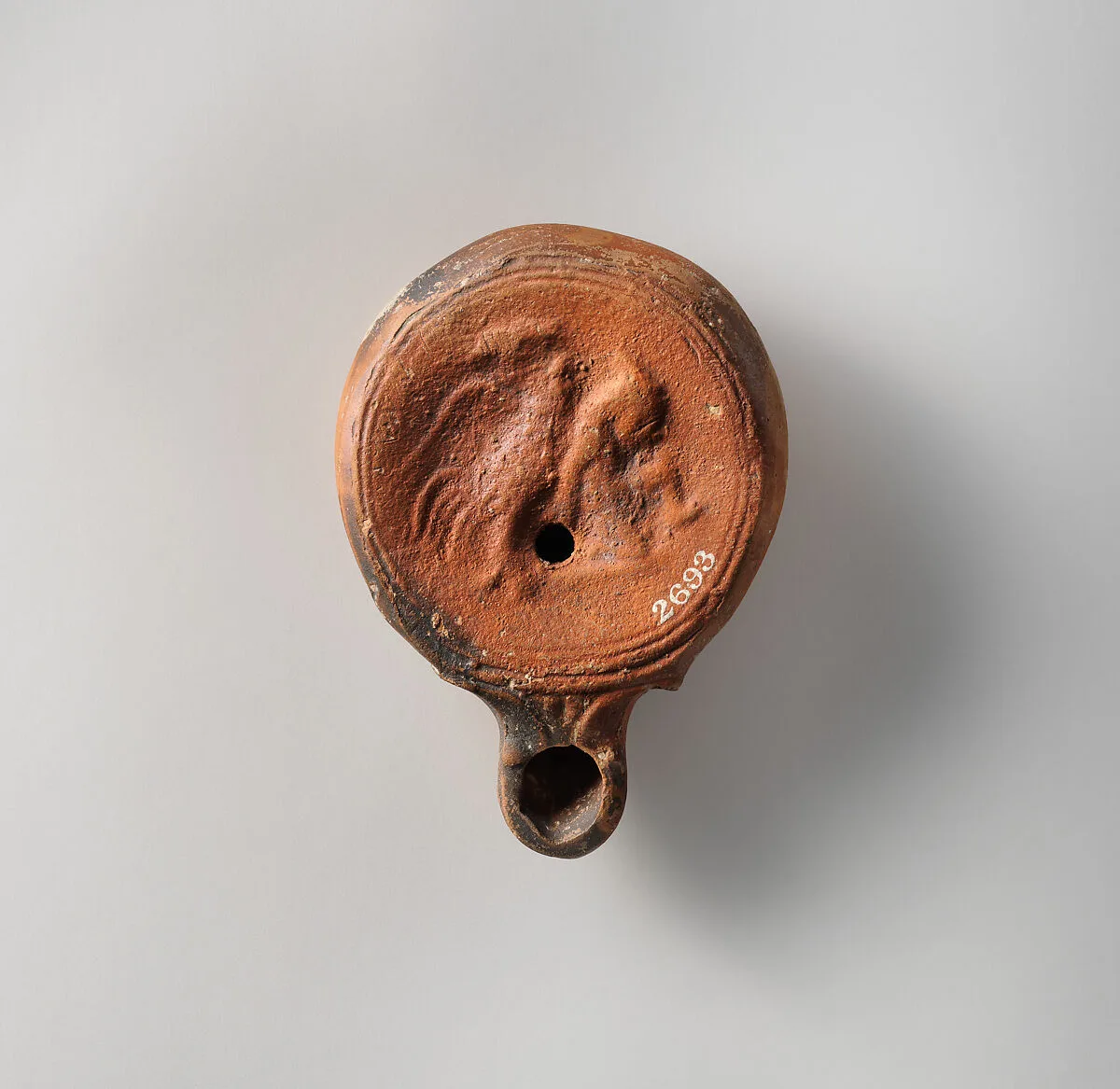 Terracotta oil lamp — Unknown