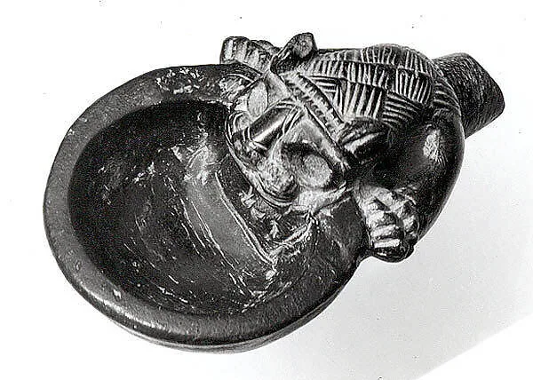 Bowl with a handle in the form of the forepart of a lion — Unknown