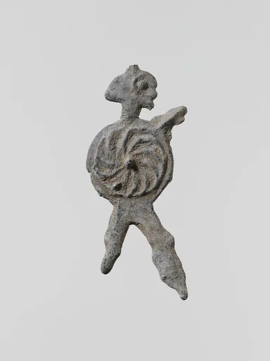 Lead figure of a warrior with a spear and shield