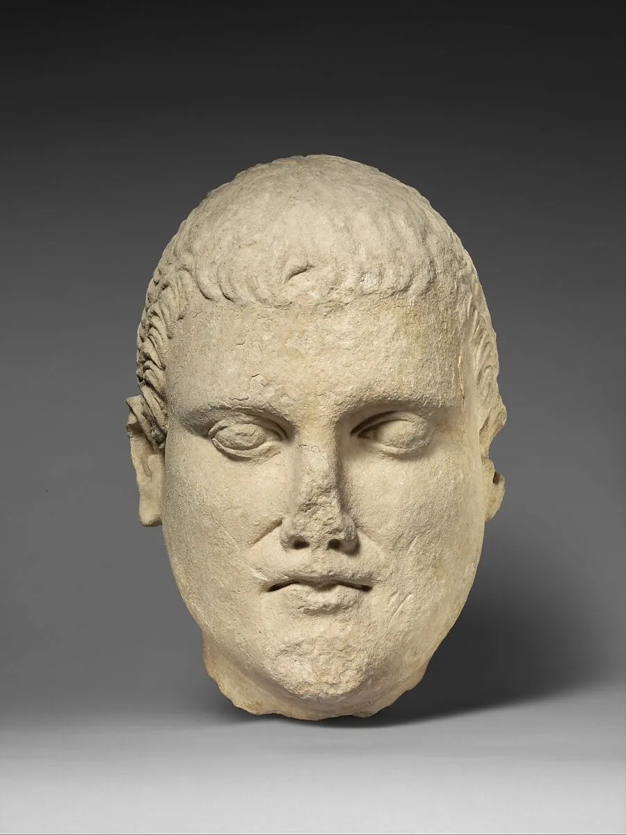 Limestone head of beardless male votary — Unknown