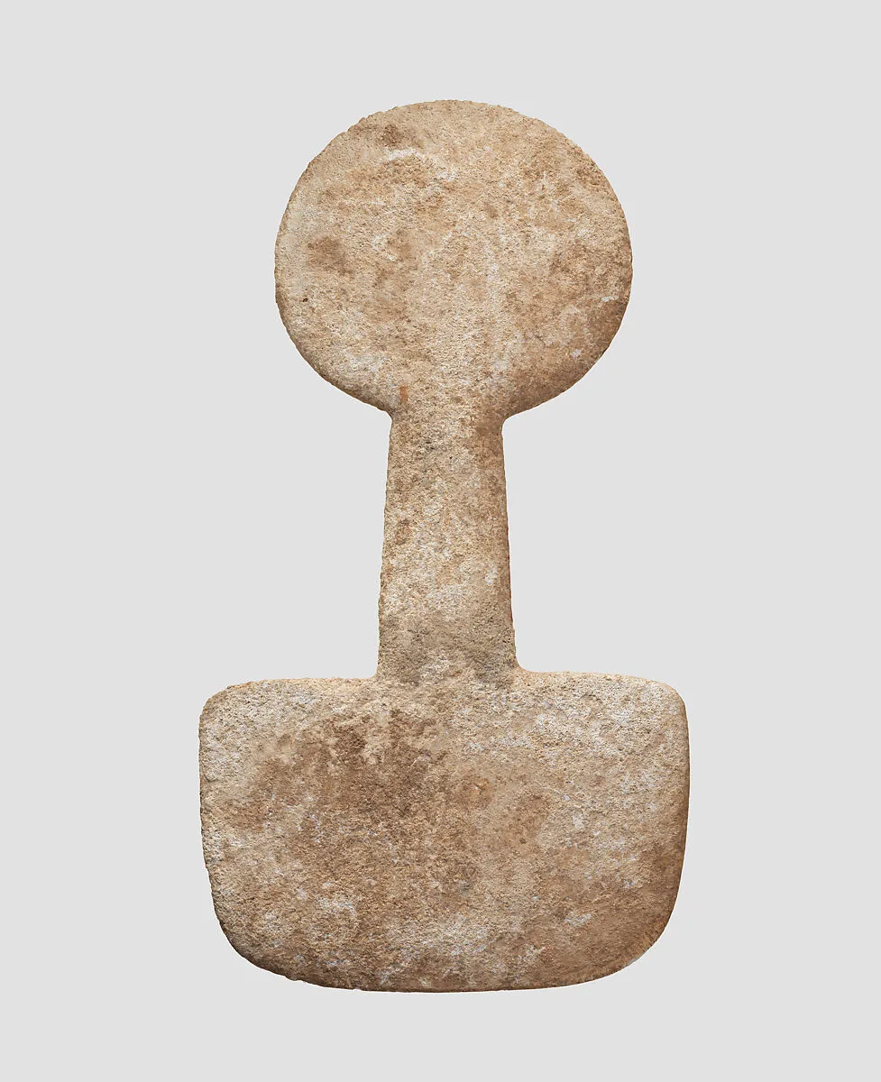 Spade-shaped schematic female (?) figure — Unknown