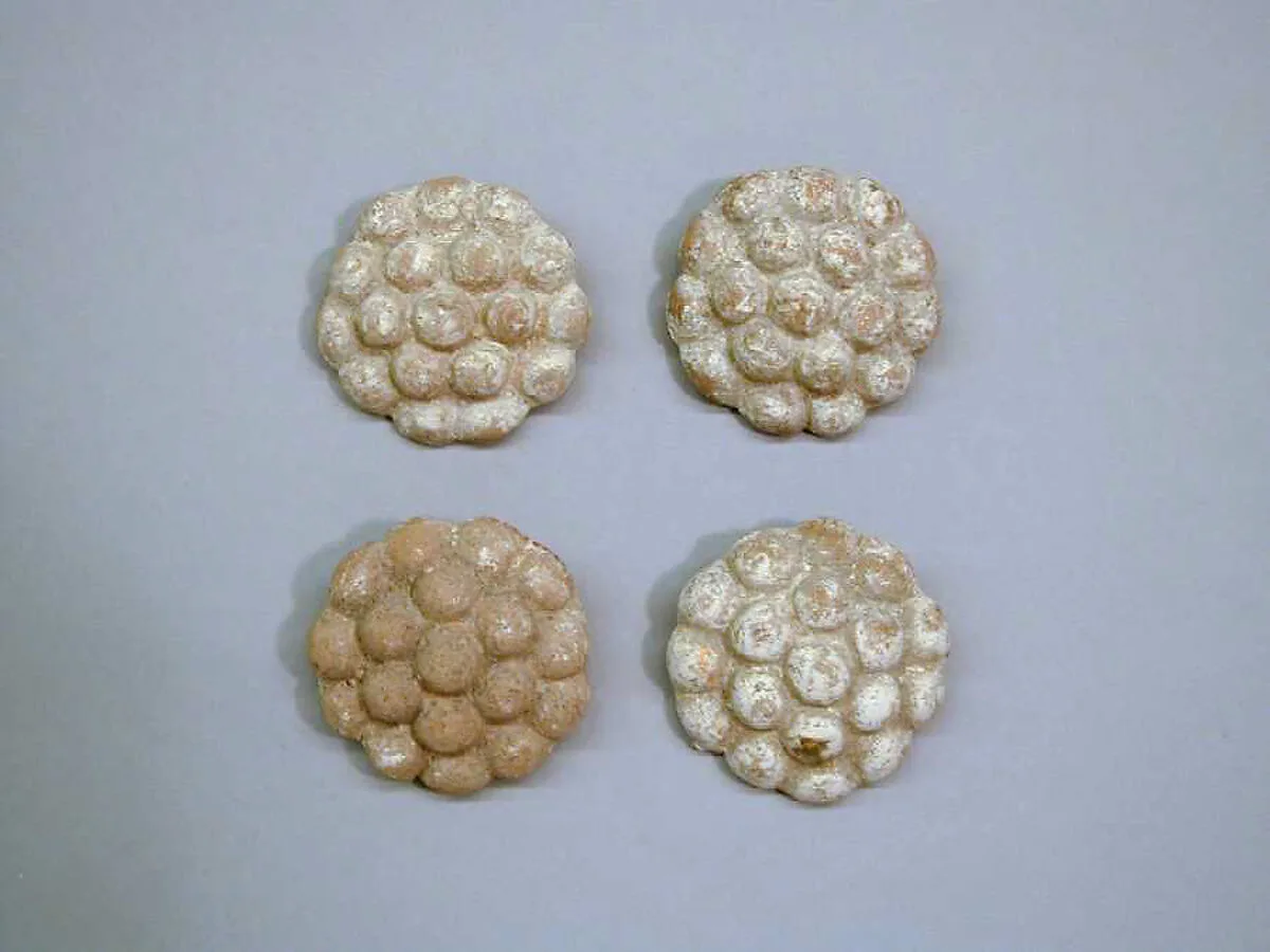 Four terracotta disks — Unknown