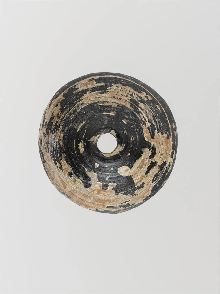 Glass spindle whorl — Unknown