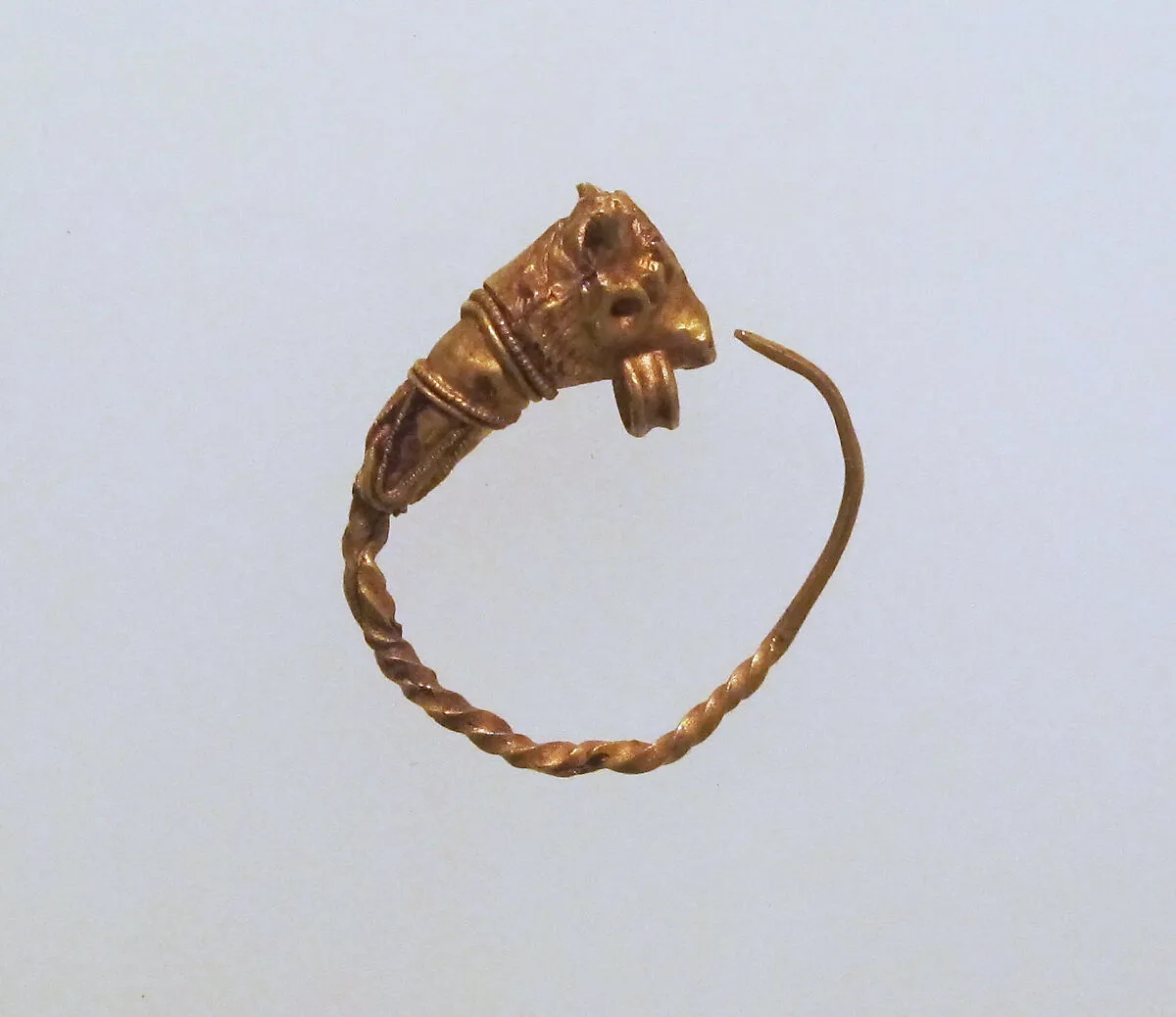 Gold earring with head of a bull — Unknown