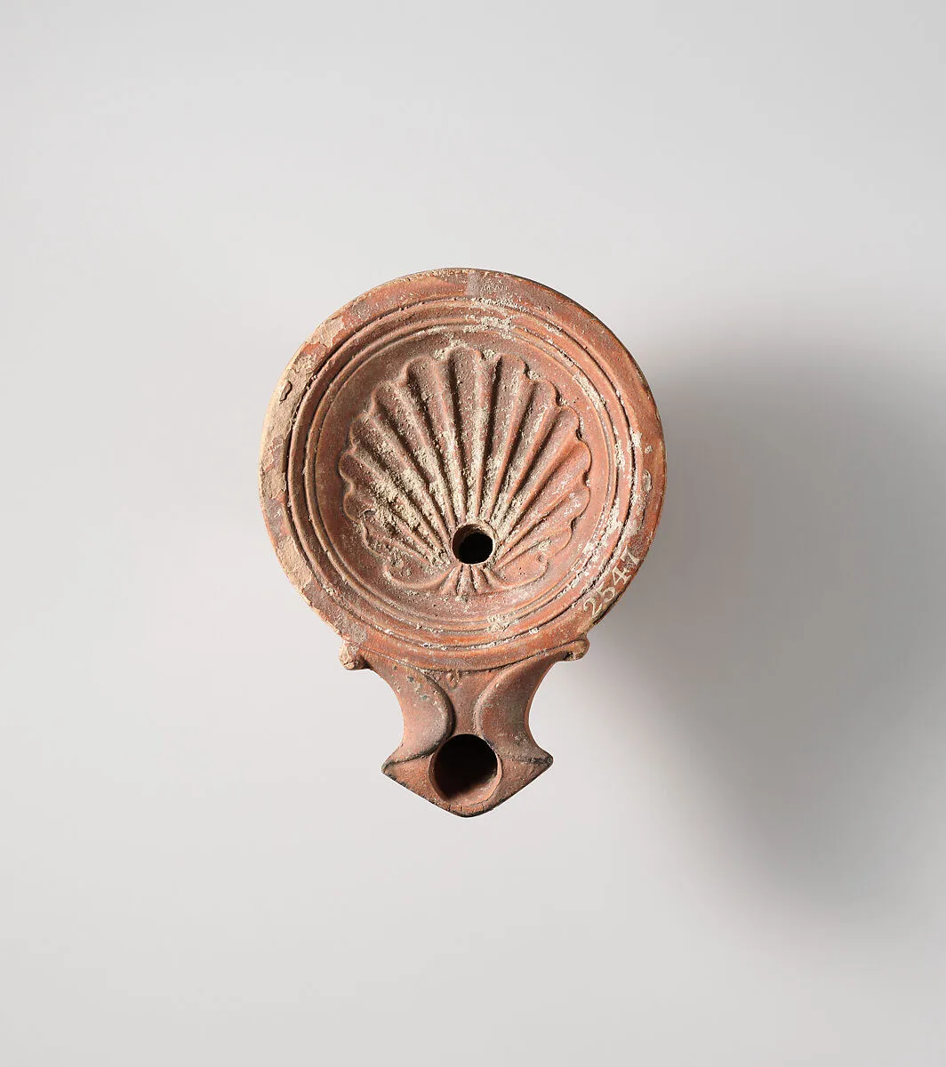 Terracotta oil lamp — Unknown