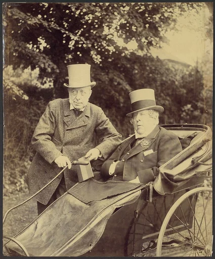 [Two Gentlemen, One in Cart]