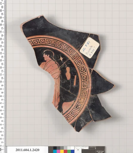 Terracotta fragment of a kylix (drinking cup)