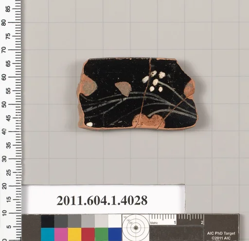 Terracotta fragment of a kylix (drinking cup)