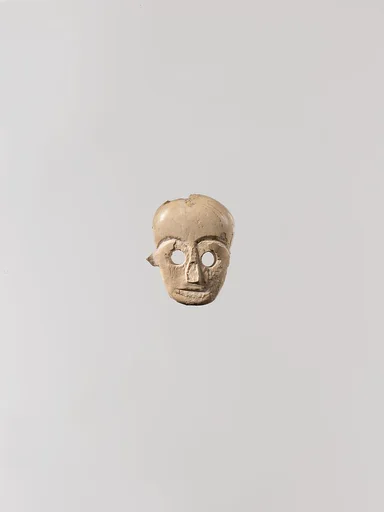 Face from a statuette