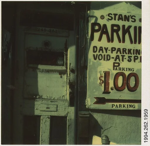 [Doorway and Sign: "Stan's Parking"]