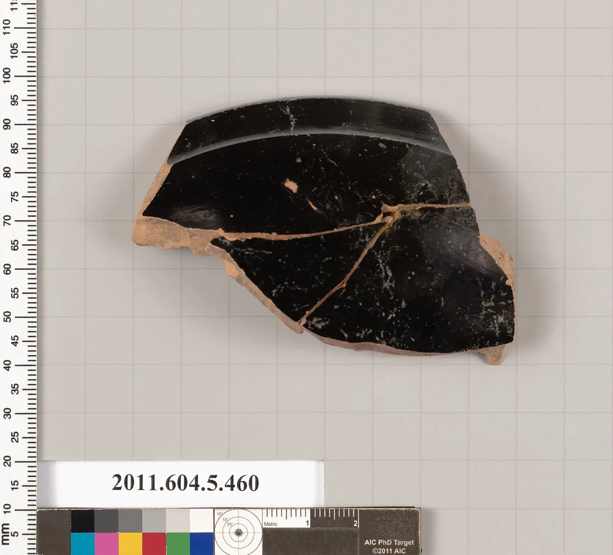 Terracotta rim fragment of a stemless kylix (drinking cup)? — Unknown