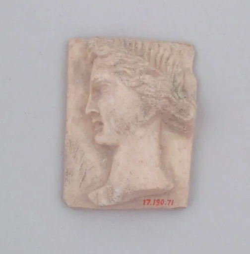 Relief of a head of woman