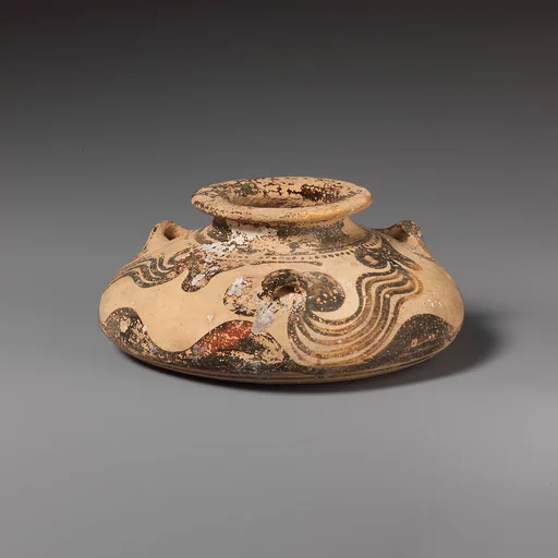 Terracotta squat alabastron (jar)