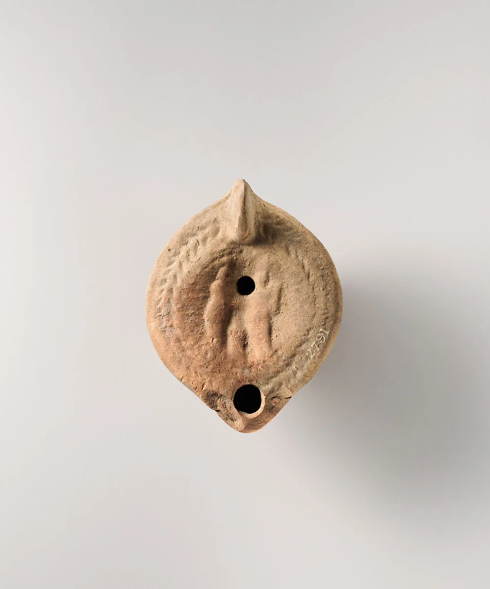 Terracotta oil lamp — Unknown